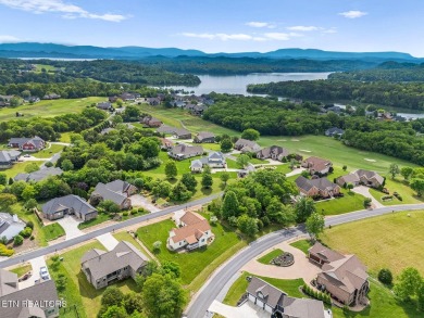 All-brick home with many upgrades is located within the Tellico on Tellico Village -The Links At Kahite Golf Course in Tennessee - for sale on GolfHomes.com, golf home, golf lot