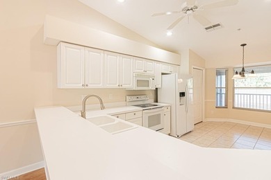 Welcome to this beautifully maintained second-floor veranda on Naples Heritage Golf and Country Club in Florida - for sale on GolfHomes.com, golf home, golf lot