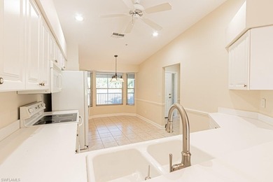 Welcome to this beautifully maintained second-floor veranda on Naples Heritage Golf and Country Club in Florida - for sale on GolfHomes.com, golf home, golf lot