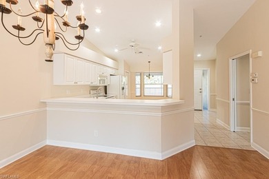 Welcome to this beautifully maintained second-floor veranda on Naples Heritage Golf and Country Club in Florida - for sale on GolfHomes.com, golf home, golf lot