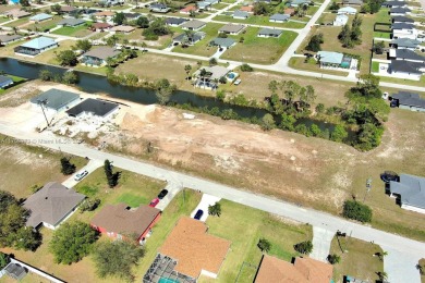 Exclusively presented by Sunland Real Estate: Oversized .35 acre on Burnt Store Golf Club in Florida - for sale on GolfHomes.com, golf home, golf lot