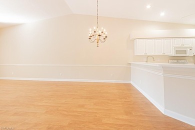 Welcome to this beautifully maintained second-floor veranda on Naples Heritage Golf and Country Club in Florida - for sale on GolfHomes.com, golf home, golf lot