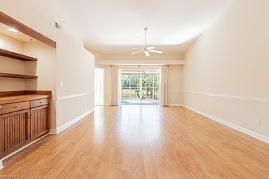 Welcome to this beautifully maintained second-floor veranda on Naples Heritage Golf and Country Club in Florida - for sale on GolfHomes.com, golf home, golf lot
