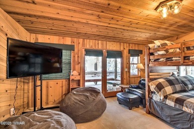 Unbelievable views of the 8th green from the gorgeous deck on White Mountain Country Club in Arizona - for sale on GolfHomes.com, golf home, golf lot