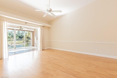 Welcome to this beautifully maintained second-floor veranda on Naples Heritage Golf and Country Club in Florida - for sale on GolfHomes.com, golf home, golf lot