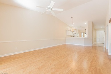 Welcome to this beautifully maintained second-floor veranda on Naples Heritage Golf and Country Club in Florida - for sale on GolfHomes.com, golf home, golf lot