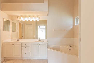 Welcome to this beautifully maintained second-floor veranda on Naples Heritage Golf and Country Club in Florida - for sale on GolfHomes.com, golf home, golf lot