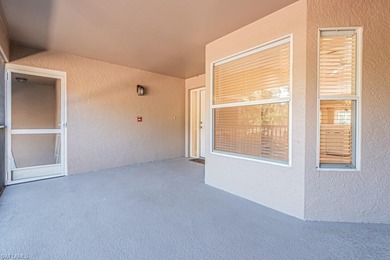 Welcome to this beautifully maintained second-floor veranda on Naples Heritage Golf and Country Club in Florida - for sale on GolfHomes.com, golf home, golf lot