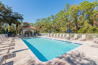 Welcome to this beautifully maintained second-floor veranda on Naples Heritage Golf and Country Club in Florida - for sale on GolfHomes.com, golf home, golf lot