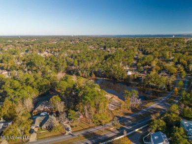 Partially Wooded Lot with 92 feet of road frontage and amazing on Diamondhead Country Club in Mississippi - for sale on GolfHomes.com, golf home, golf lot