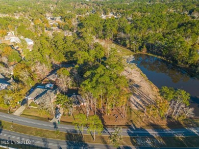 Partially Wooded Lot with 92 feet of road frontage and amazing on Diamondhead Country Club in Mississippi - for sale on GolfHomes.com, golf home, golf lot