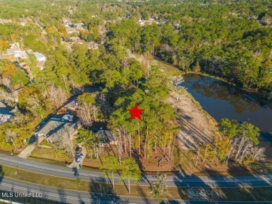Partially Wooded Lot with 92 feet of road frontage and amazing on Diamondhead Country Club in Mississippi - for sale on GolfHomes.com, golf home, golf lot