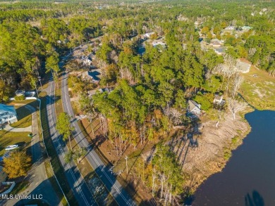 Partially Wooded Lot with 92 feet of road frontage and amazing on Diamondhead Country Club in Mississippi - for sale on GolfHomes.com, golf home, golf lot