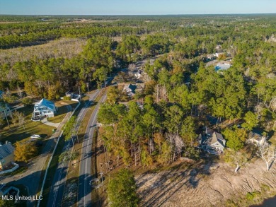 Partially Wooded Lot with 92 feet of road frontage and amazing on Diamondhead Country Club in Mississippi - for sale on GolfHomes.com, golf home, golf lot
