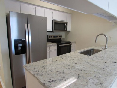 Don't miss your chance to own this updated three-bedroom on Mystical Golf Man O War Golf Links in South Carolina - for sale on GolfHomes.com, golf home, golf lot
