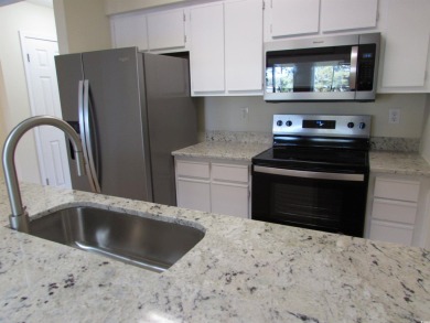 Don't miss your chance to own this updated three-bedroom on Mystical Golf Man O War Golf Links in South Carolina - for sale on GolfHomes.com, golf home, golf lot