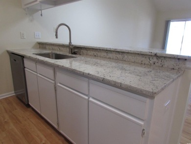 Don't miss your chance to own this updated three-bedroom on Mystical Golf Man O War Golf Links in South Carolina - for sale on GolfHomes.com, golf home, golf lot