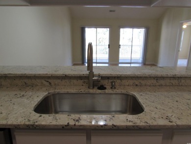 Don't miss your chance to own this updated three-bedroom on Mystical Golf Man O War Golf Links in South Carolina - for sale on GolfHomes.com, golf home, golf lot