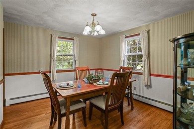 Nestled in the desirable Warwick Neck community, this inviting on Warwick Country Club in Rhode Island - for sale on GolfHomes.com, golf home, golf lot