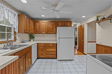 Nestled in the desirable Warwick Neck community, this inviting on Warwick Country Club in Rhode Island - for sale on GolfHomes.com, golf home, golf lot