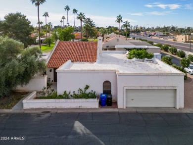 Located in a cozy 12-home community, this 3-bedroom, 2-bathroom on Mesa Country Club in Arizona - for sale on GolfHomes.com, golf home, golf lot