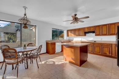 Located in a cozy 12-home community, this 3-bedroom, 2-bathroom on Mesa Country Club in Arizona - for sale on GolfHomes.com, golf home, golf lot