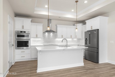 Ranch living at its best in this Promenade III Plan with on Ocean Ridge Plantation in North Carolina - for sale on GolfHomes.com, golf home, golf lot