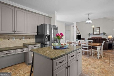 Welcome home to this timeless brick traditional nestled at the on Brookstone Golf and Country Club in Georgia - for sale on GolfHomes.com, golf home, golf lot