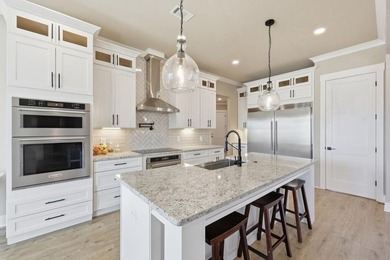 Simple luxury at its finest! Discover this rare ranch plan on Traditions of Braselton Golf Club in Georgia - for sale on GolfHomes.com, golf home, golf lot