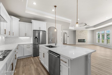 Ranch living at its best in this Promenade III Plan with on Ocean Ridge Plantation in North Carolina - for sale on GolfHomes.com, golf home, golf lot