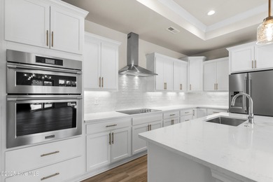 Ranch living at its best in this Promenade III Plan with on Ocean Ridge Plantation in North Carolina - for sale on GolfHomes.com, golf home, golf lot