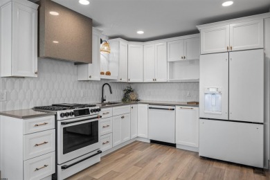 This beautifully renovated 6 bedroom 4 bath modern chic duplex on Ocean City Muni Golf Course in New Jersey - for sale on GolfHomes.com, golf home, golf lot