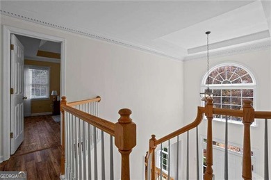 Welcome home to this timeless brick traditional nestled at the on Brookstone Golf and Country Club in Georgia - for sale on GolfHomes.com, golf home, golf lot