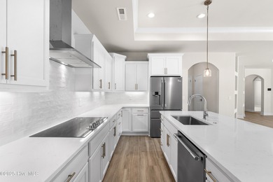 Ranch living at its best in this Promenade III Plan with on Ocean Ridge Plantation in North Carolina - for sale on GolfHomes.com, golf home, golf lot