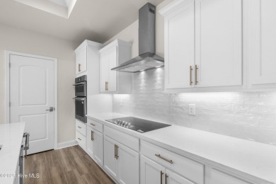 Ranch living at its best in this Promenade III Plan with on Ocean Ridge Plantation in North Carolina - for sale on GolfHomes.com, golf home, golf lot