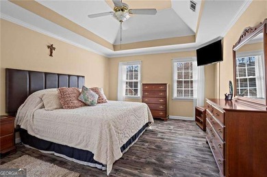 Welcome home to this timeless brick traditional nestled at the on Brookstone Golf and Country Club in Georgia - for sale on GolfHomes.com, golf home, golf lot