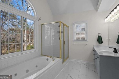 Welcome home to this timeless brick traditional nestled at the on Brookstone Golf and Country Club in Georgia - for sale on GolfHomes.com, golf home, golf lot