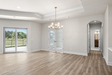 Ranch living at its best in this Promenade III Plan with on Ocean Ridge Plantation in North Carolina - for sale on GolfHomes.com, golf home, golf lot