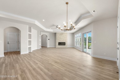 Ranch living at its best in this Promenade III Plan with on Ocean Ridge Plantation in North Carolina - for sale on GolfHomes.com, golf home, golf lot