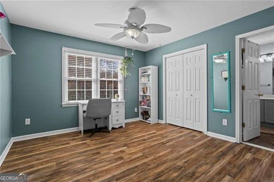 Welcome home to this timeless brick traditional nestled at the on Brookstone Golf and Country Club in Georgia - for sale on GolfHomes.com, golf home, golf lot