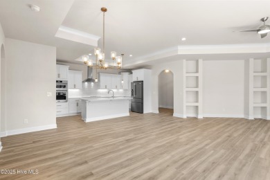 Ranch living at its best in this Promenade III Plan with on Ocean Ridge Plantation in North Carolina - for sale on GolfHomes.com, golf home, golf lot