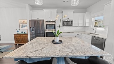 If you're relocating to Savannah, Georgia and want a home that on Sterling Links Golf Club in Georgia - for sale on GolfHomes.com, golf home, golf lot