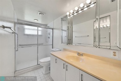 ARUBA VILLAGE IN THE HEART OF WYNMOOR WITH PANORAMIC GOLF COURSE on Wynmoor Golf Course in Florida - for sale on GolfHomes.com, golf home, golf lot