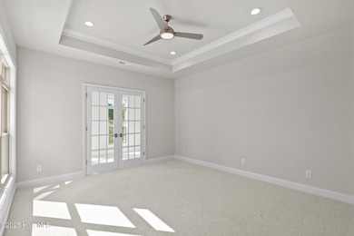 LOT 9 - Ranch living at its best in this Promenade III Plan with on Ocean Ridge Plantation in North Carolina - for sale on GolfHomes.com, golf home, golf lot