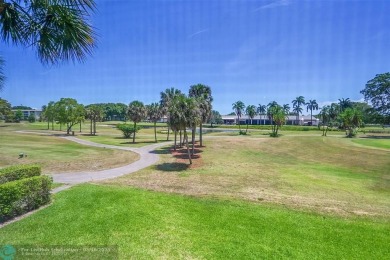 ARUBA VILLAGE IN THE HEART OF WYNMOOR WITH PANORAMIC GOLF COURSE on Wynmoor Golf Course in Florida - for sale on GolfHomes.com, golf home, golf lot