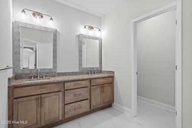 Ranch living at its best in this Promenade III Plan with on Ocean Ridge Plantation in North Carolina - for sale on GolfHomes.com, golf home, golf lot