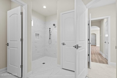 Ranch living at its best in this Promenade III Plan with on Ocean Ridge Plantation in North Carolina - for sale on GolfHomes.com, golf home, golf lot