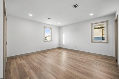 This beautifully renovated 6 bedroom 4 bath modern chic duplex on Ocean City Muni Golf Course in New Jersey - for sale on GolfHomes.com, golf home, golf lot