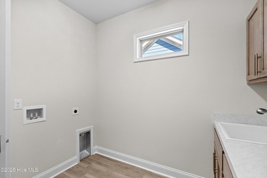 LOT 9 - Ranch living at its best in this Promenade III Plan with on Ocean Ridge Plantation in North Carolina - for sale on GolfHomes.com, golf home, golf lot