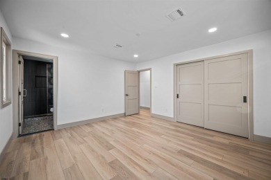 This beautifully renovated 6 bedroom 4 bath modern chic duplex on Ocean City Muni Golf Course in New Jersey - for sale on GolfHomes.com, golf home, golf lot